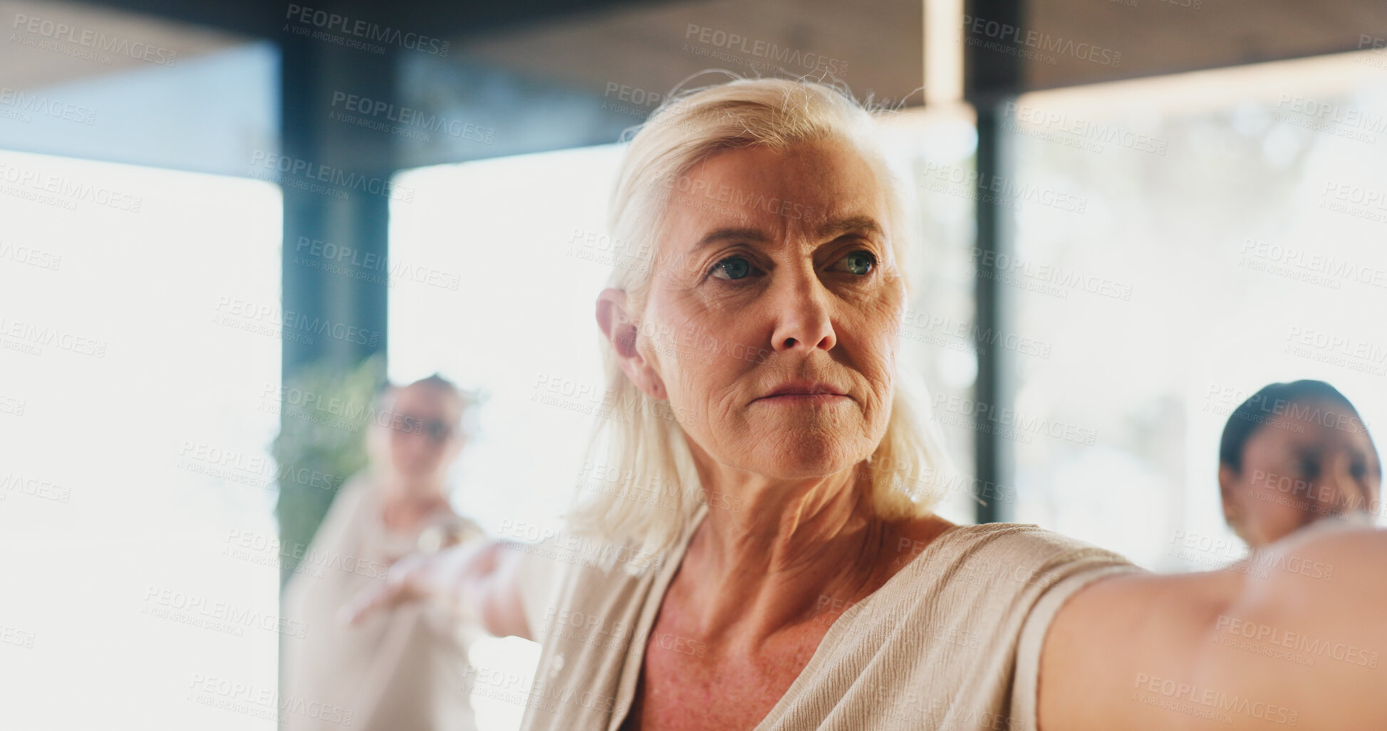Buy stock photo Mature woman, warrior pose and yoga class with group holistic fitness, zen and course at studio. People, meditation and mindfulness with circulation, breathing exercise or balance at wellness club