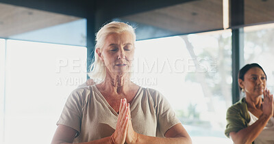 Buy stock photo Mature woman, meditation and prayer hands at yoga studio with mudra for breathing exercise in gym. Person, holistic fitness and mindfulness at class, namaste pose and group with zen at wellness club