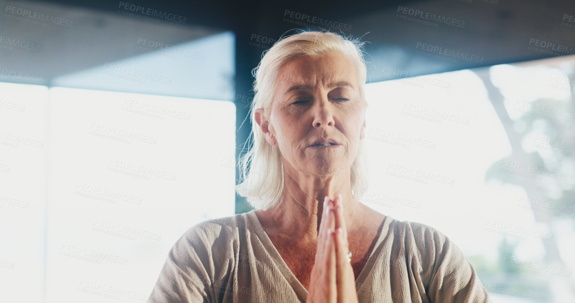 Buy stock photo Mature woman, mindfulness and prayer hands at yoga studio with mudra for breathing exercise in gym. Person, holistic fitness and eyes closed with zen, namaste pose and meditation at wellness club
