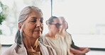Exercise, meditation and zen with senior women in studio for balance, inner peace or mindfulness. Awareness, fitness and yoga with group of calm old people in wellness class for mental health
