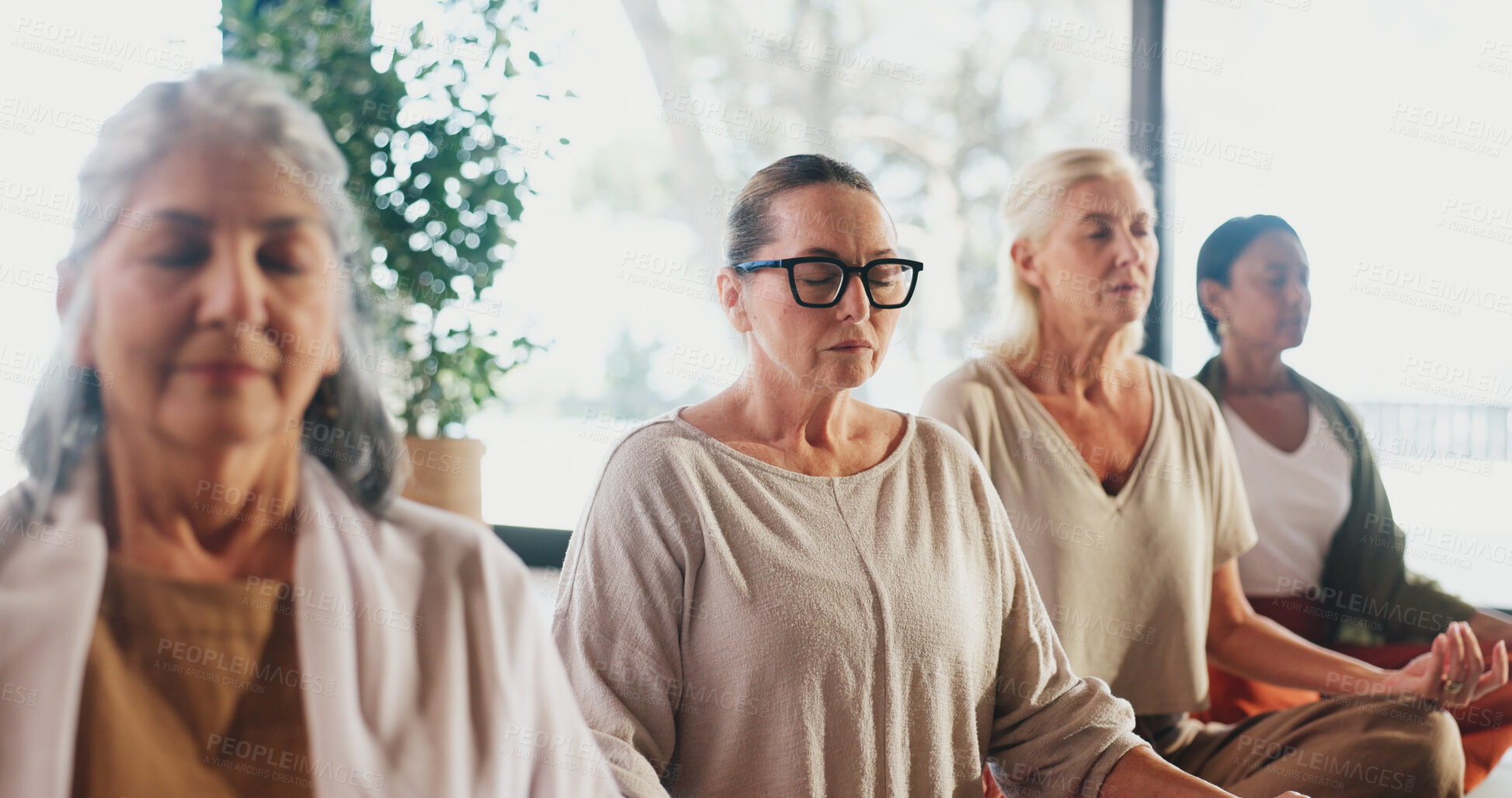 Buy stock photo Meditation, yoga and zen with senior women in studio for balance, inner peace or mindfulness. Awareness, exercise and fitness with group of calm old people in wellness class for mental health