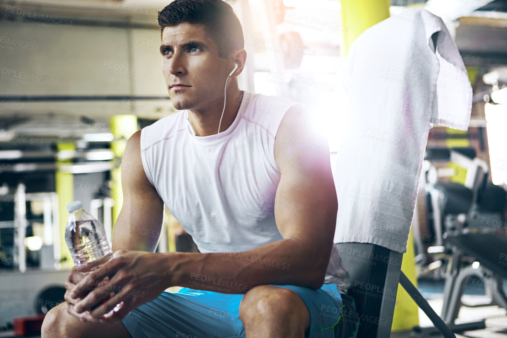 Buy stock photo Thinking, man and break with earphones in gym for fitness recovery, workout pause and water. Athlete, person and relax with music playlist at health club for exercise rest and contemplating training