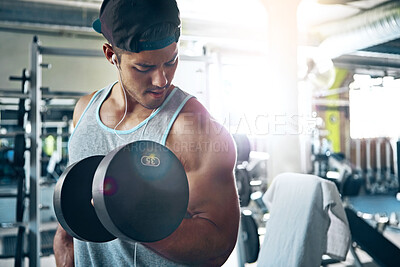 Buy stock photo Exercise, earphones or athlete with dumbbells, gym soundtrack or music subscription in bodybuilding. Fitness, flare or man with tech, workout challenge or weightlifting with audio streaming.