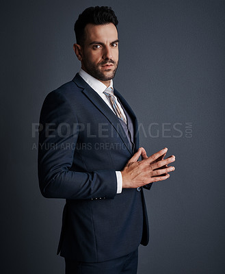 Buy stock photo Portrait, serious and business man in studio as corporate lawyer, about us and ambition. Attorney, legal professional and person with career pride, justice or confident on gray background in Portugal