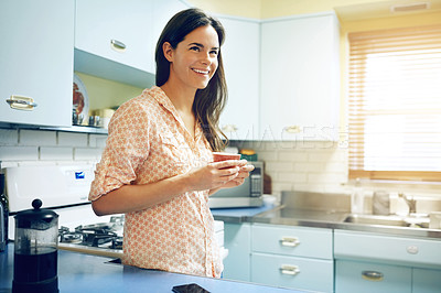 Buy stock photo Thinking, woman and happy with coffee in kitchen to start day, peaceful morning or ideas for weekend. Relax, person and thoughtful with beverage in home for caffeine break, reflection and daydreaming