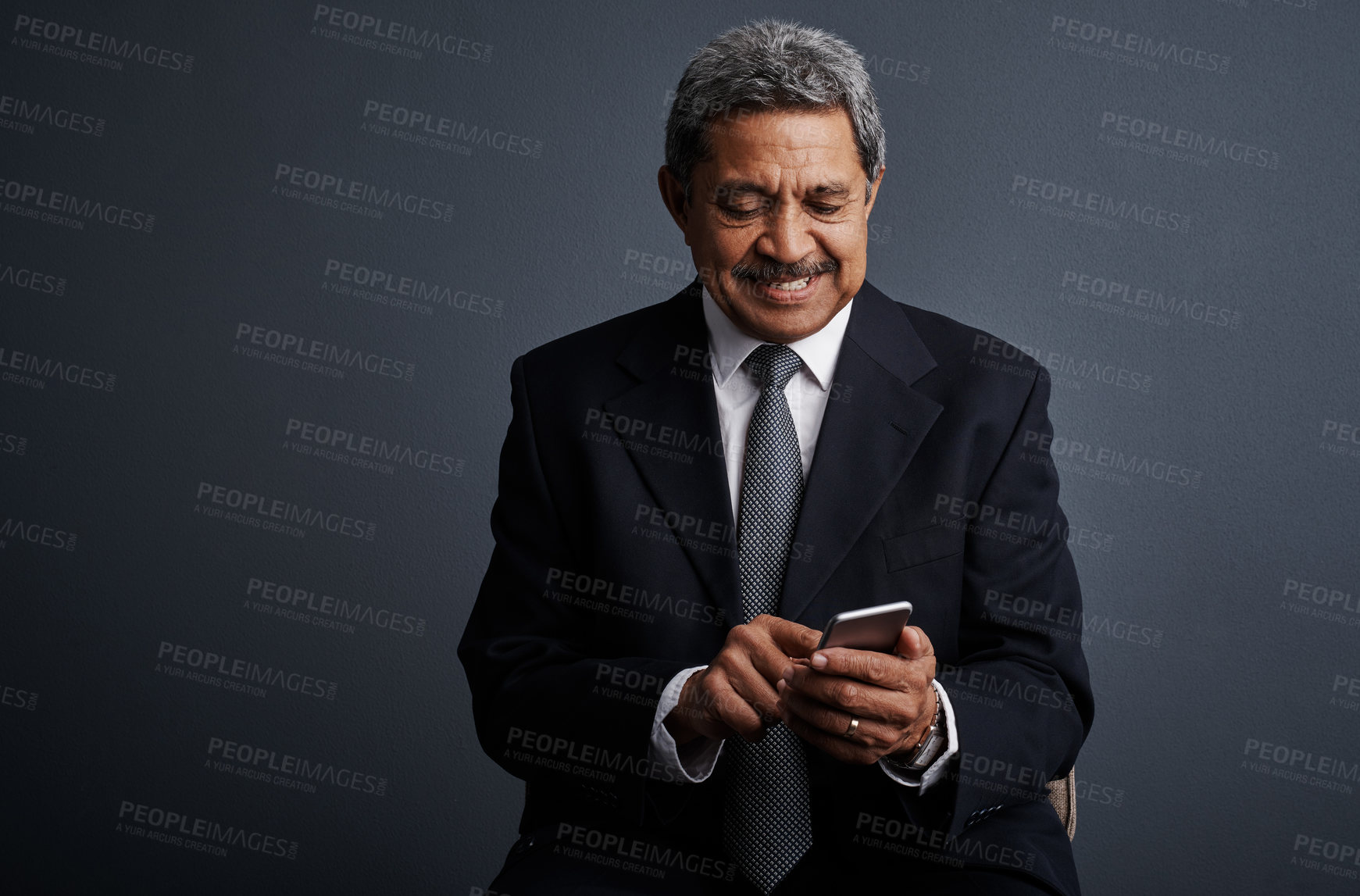 Buy stock photo Phone, search and professional with business man in studio for realtor negotiation, network or chat. Communication, virtual property advisor or connection with mature person on dark background space