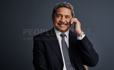 Buy stock photo Phone call, portrait and professional with business man in studio for realtor negotiation, network or chat. Communication, virtual property advisor or connection with mature person on dark background