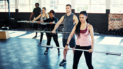 Buy stock photo Woman, class and weightlifting with steel bar at gym for strength training, fitness or routine. Female instructor, people and muscle workout at health club for power challenge and functional exercise