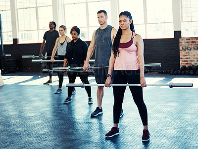 Buy stock photo Woman, group and weightlifting bar at gym for strength training, functional exercise and health. Female instructor, people or muscle workout at fitness class for power challenge, mobility or wellness