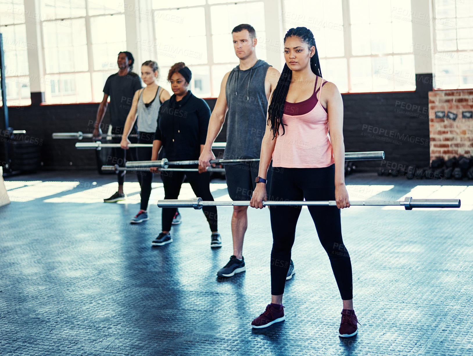 Buy stock photo Woman, group and weightlifting bar at gym for strength training, functional exercise and health. Female instructor, people or muscle workout at fitness class for power challenge, mobility or wellness