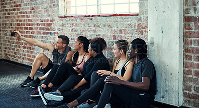 Buy stock photo Friends, selfie and smile on gym floor for fitness, memory and bonding with post on web at wellness class. People, group and happy with photography, profile picture or social media at exercise club