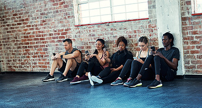 Buy stock photo Class, fitness and phone with people in gym for workout, athlete coaching app and contact. Virtual training community, exercise club and online personal trainer with friends in sports center