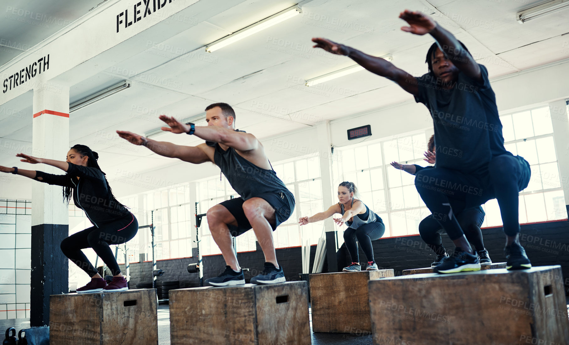 Buy stock photo Club, fitness and squat with people on box for workout, gym equipment and bodybuilder. Wellness, exercise class and plyometric training with group of friends in sports center for platform and health