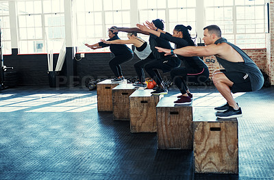 Buy stock photo Fitness, lunge or people in gym class with crates, cardio workout or calorie burn in team training. Exercise, athletes or instructor with equipment, group session or intense jumping for weight loss.