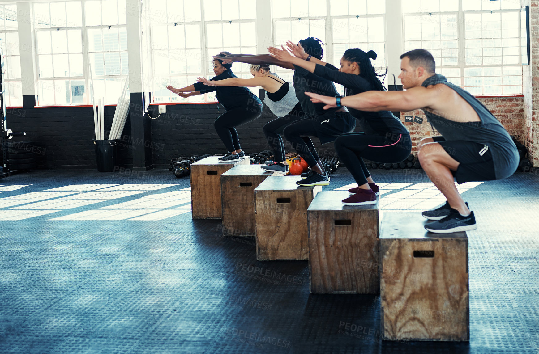 Buy stock photo Fitness, lunge or people in gym class with crates, cardio workout or calorie burn in team training. Exercise, athletes or instructor with equipment, group session or intense jumping for weight loss.