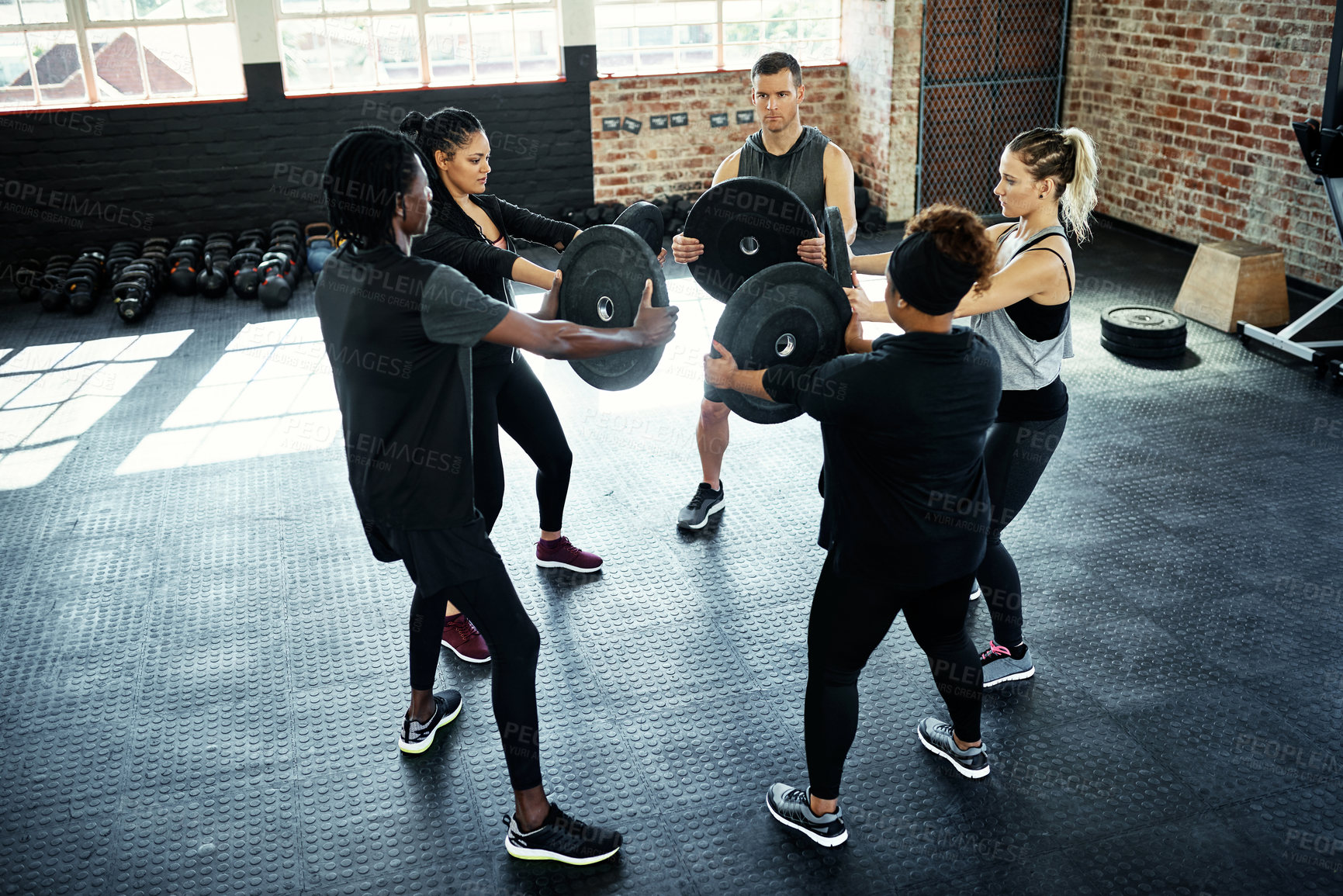 Buy stock photo Gym, fitness and people in class with weights for exercise, workout and bodybuilder training. Sports club, trainer and men and women with equipment for weightlifting, muscle strength and challenge