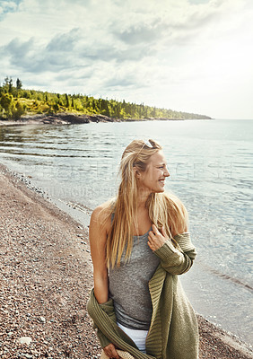 Buy stock photo Walking, smile and woman with vacation by beach, summer travel trip and peaceful getaway for tourism. Sunshine, weekend journey and person with holiday by ocean, view and explore seaside destination