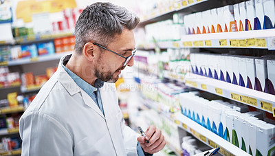 Buy stock photo Pharmacist, man or clipboard with shelf inspection for inventory check, medical info and expiry date. Chemist, mature person and checklist in store for stock count, quality assurance and dispensary