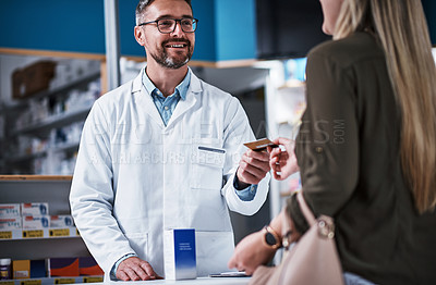 Buy stock photo Man, woman and pharmacy with credit card for medicine, pills and advice for healthcare products at shop. People, discussion and customer experience with paperless sale, fintech or deal at drug store