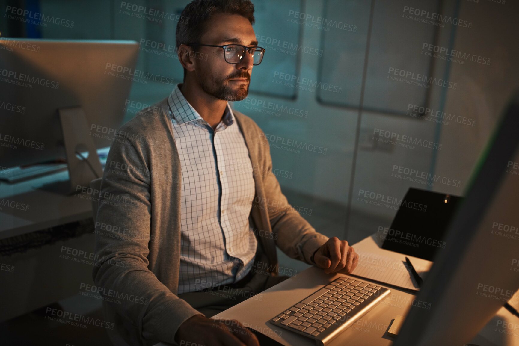 Buy stock photo Night, computer and planning with business man office for online, research and it web system. Overtime, reading and project manager with employee in tech agency for operations launch or developer