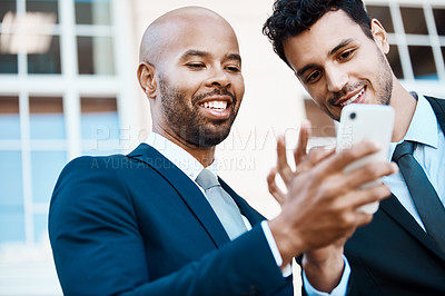 Buy stock photo Businessmen, friends and phone with smile for communication, social media and commute in city. Low angle, employees and tech for online video, travel research or app for networking in urban town