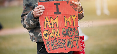 Buy stock photo Person, rally and poster with for vaccine passport, opinion or sign for corona, medical or human rights. Hands, board and fight to stop pharma crime for choice, decision and covid with voice in park