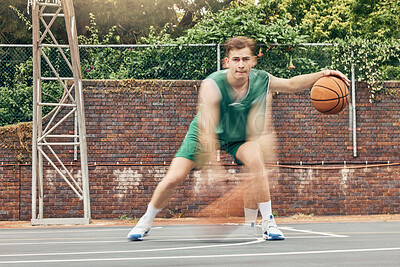 Buy stock photo Basketball, sport and fitness with a sports man training, exercising or speed dribbling on a court with motion blur effect. Exercise, workout and health with a fast athlete playing a game outside