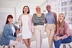 Diversity, women and portrait of a team in the office in meeting, team building or project planning. Happiness, collaboration and work friends standing together in their coworking space in workplace.