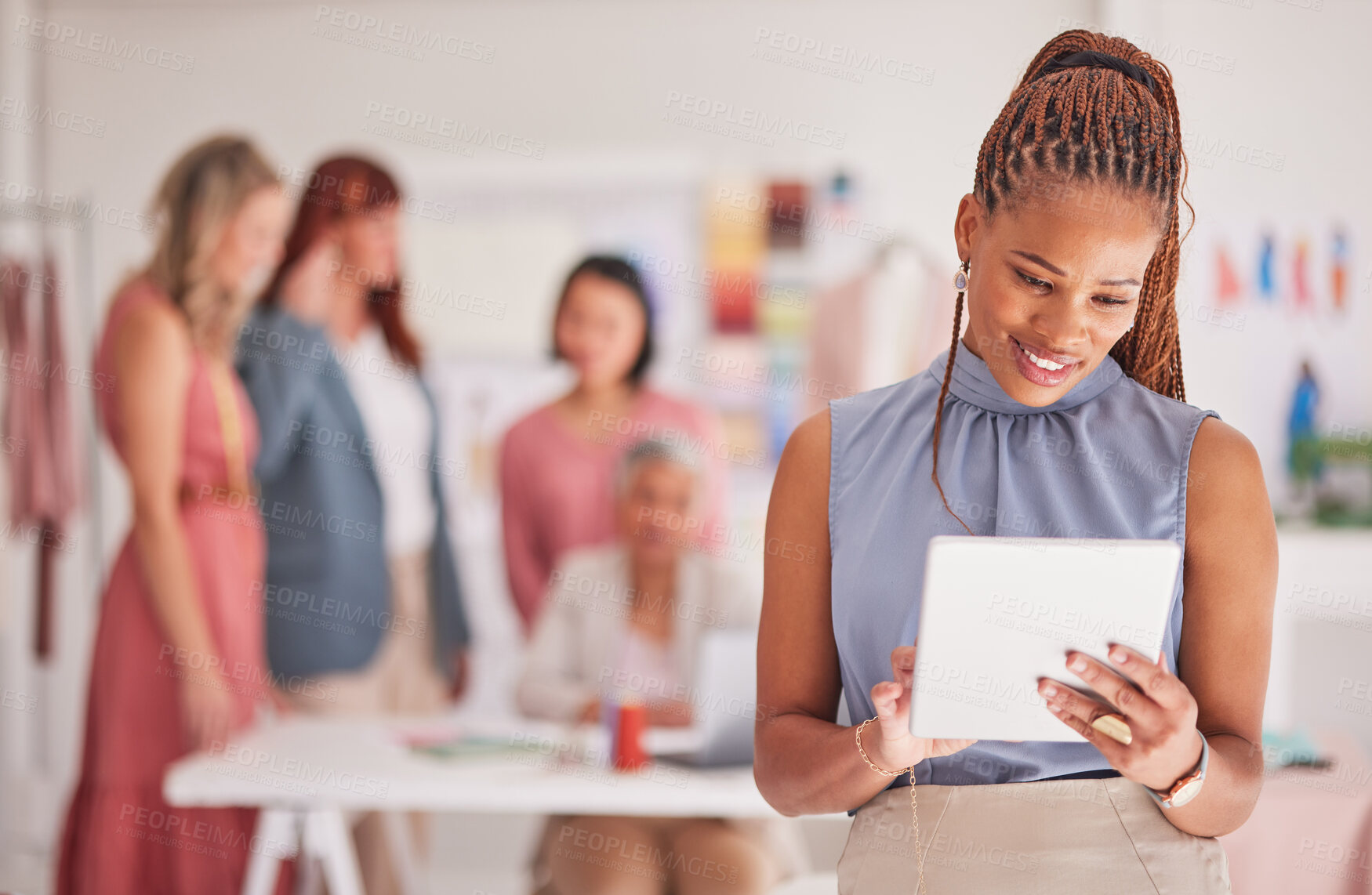 Buy stock photo Tablet, fashion designer and planning a marketing strategy online and check email, internet oder and work schedule. Black woman working in textile industry with digital technology in staff meeting