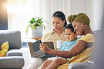 Tablet selfie, happy and family child, mom or bisexual people pose for social network post, memory picture or bonding. Media app picture, lesbian mothers and relax gay woman, kid or son on home sofa
