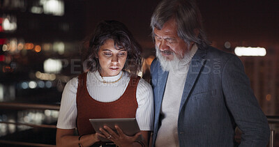 Buy stock photo Tablet, night and professional people reading, analysis and check sales data, research information or web project. Rooftop, personal assistant and mature manager teamwork on online report review