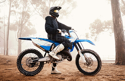 Buy stock photo Motorcycle, person and sports in woods with training for competition, ride in nature with action and helmet. Extreme, adrenaline and exercise, athlete and transport with dirt bike, freedom and travel
