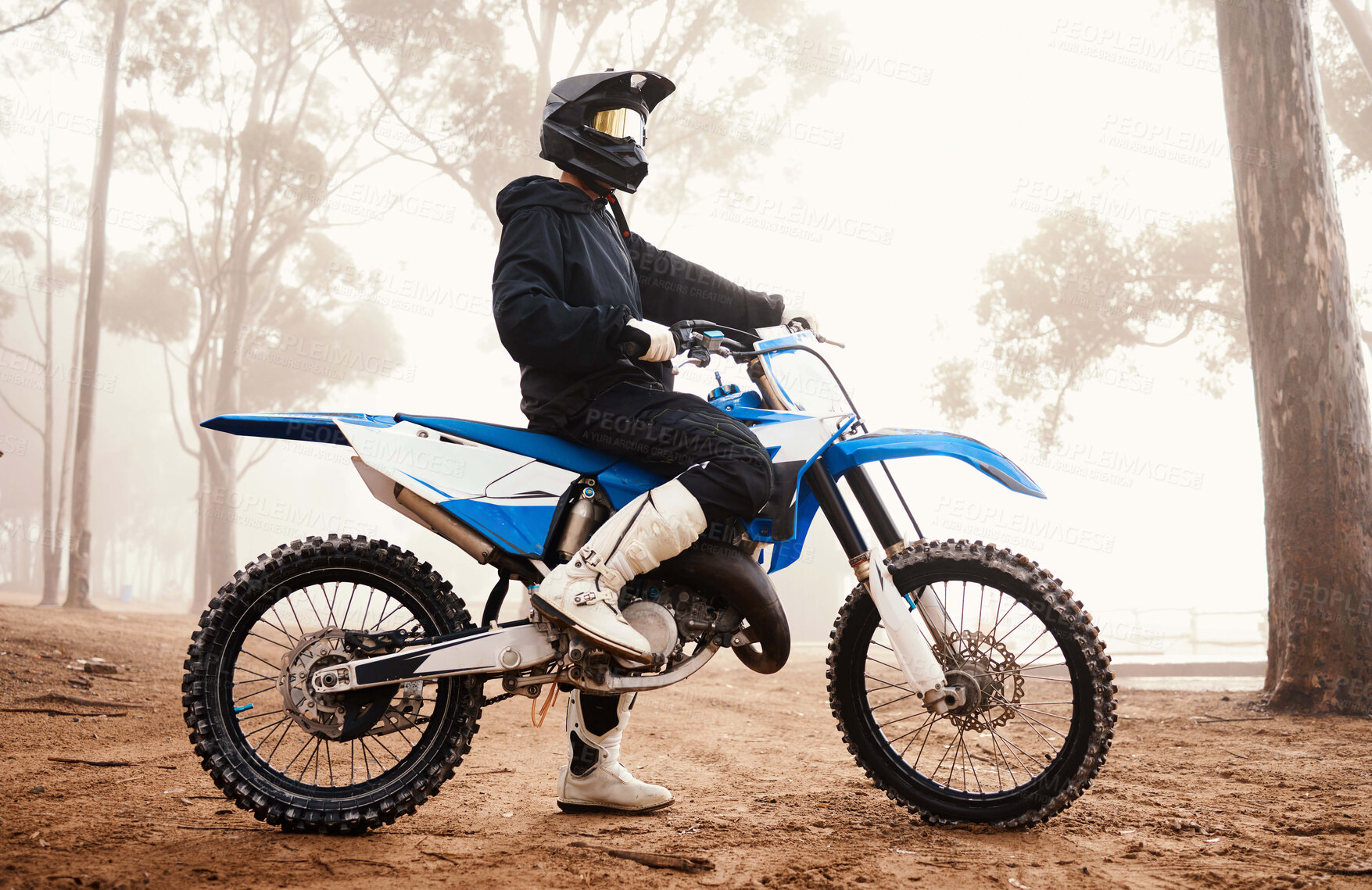 Buy stock photo Motorcycle, person and sports in woods with training for competition, ride in nature with action and helmet. Extreme, adrenaline and exercise, athlete and transport with dirt bike, freedom and travel