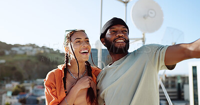 Buy stock photo Couple of friends, pointing and outdoor in city for fun adventure, interracial love and happiness. African man and trendy gen z woman excited together for travel, urban date and freedom or relax