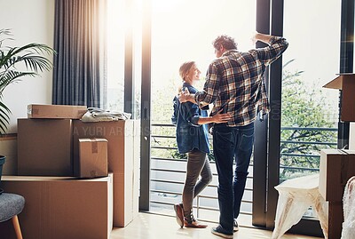 Buy stock photo Boxes, couple and hug at glass door in new home for talking, property investment and moving in. Flare, people and conversation in house for relocation, real estate achievement and mortgage ownership