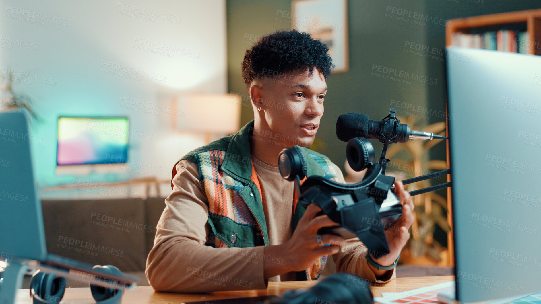 Buy stock photo Man, influencer or gamer streaming with vr goggles for online tutorial or guide at home. Male person, freelancer or caster talking with technology or mic for audio podcast, tips or gaming review