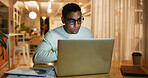 Documents, laptop and web designer with business man in office at night for work on coding or programming. Computer, creative and reading with website programmer in workplace for evening deadline