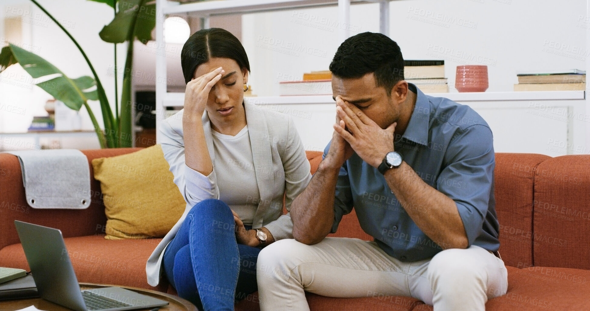Buy stock photo Sofa, business people and stress with laptop for debt, company bankruptcy or mistake. Man, woman or colleagues in office with anxiety, budget project and frustrated for deadline or financial crisis