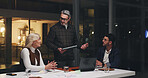 Business people, tablet and planning at night for brainstorming, schedule or project deadline. Group, employees or team working late with technology for creative development or agenda in office