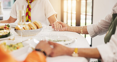 Buy stock photo People, holding hands and praying with food on dining table for gratitude, appreciation and faith. Group, friends or social gathering with trust, meal or hope for culture, feast or tradition in home