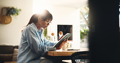 Buy stock photo Tablet, research and woman in home office for remote work, reading or review ebook. Technology, mature author and freelancer in house for planning story, editing manuscript and email for publication