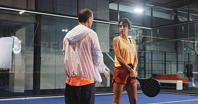 Buy stock photo Padel, woman and coach on court, practice and planning for match, talk and strategy for competition. Tennis player, mature people and prepare for game with instructor, team and training for sport