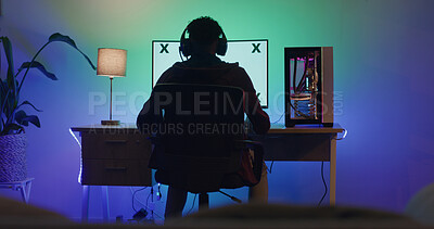 Buy stock photo Man, computer screen and gamer with headphones in home, night and mockup space for user experience. Person, pc and monitor with back, streaming and online video game with challenge at apartment
