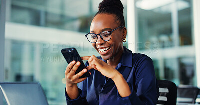 Buy stock photo Phone, smile and black woman in office with message, communication or notification on mobile app. Cellphone, laptop and business person with networking, texting or social media on break in workplace