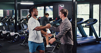 Buy stock photo Men, athlete and manager with handshake at gym for welcome, fitness support or respect. Happy, people and worker with shaking hands at health club for workout motivation, friendly service or greeting