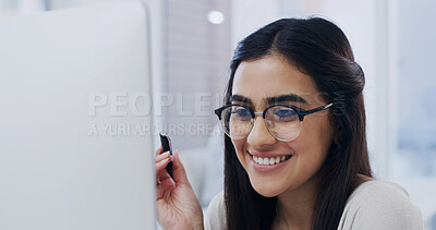 Buy stock photo Computer, reading and smile with designer woman in office for online planning or research. Glasses, pc and thinking with happy design professional in creative workplace for development or review