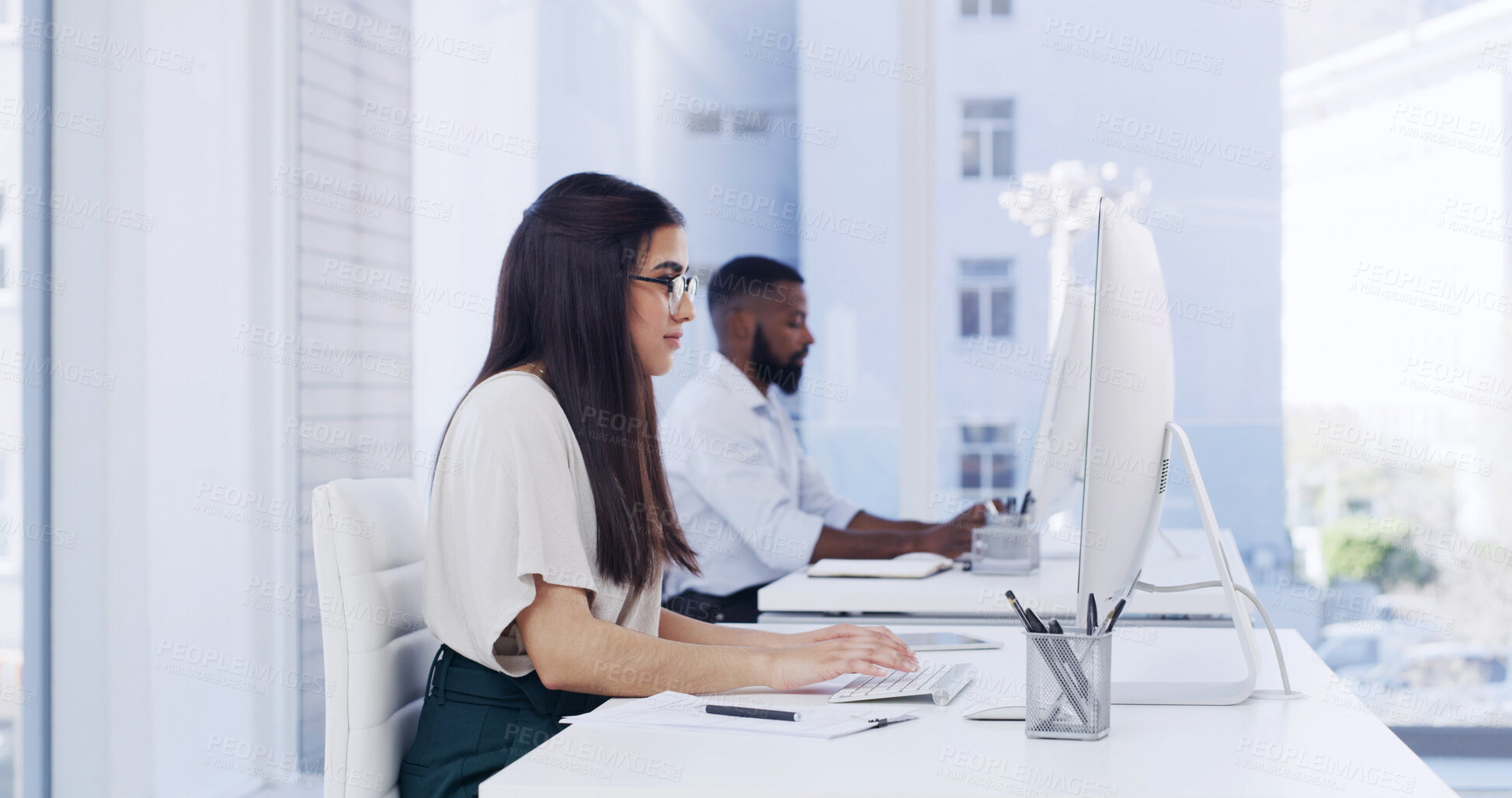Buy stock photo Creative, woman and typing in office with computer, research story or news report for journalism. Coworking, person and browse in workplace with pc, planning or editing article for media publication.
