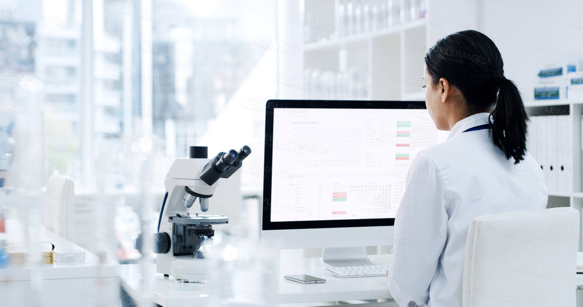 Buy stock photo Back, woman and scientist with computer in lab for research, experiment and medical report. Female person, reading and pc screen with schedule, investigation results and information for vaccine study