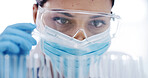 Woman, scientist and test tube with face mask at lab for medical research, ppe or cure for virus, Person, gloves and container with glasses for science, pharmaceutical study or vaccine development