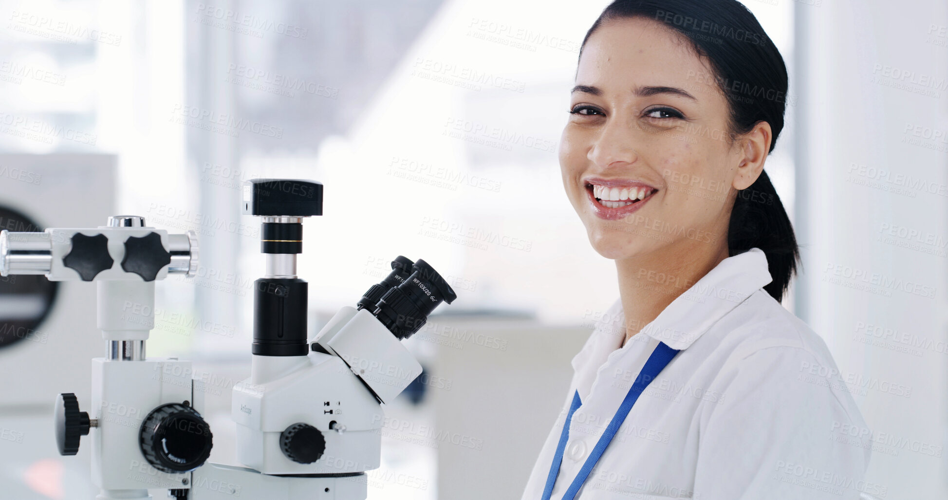 Buy stock photo Portrait, happy woman and scientist with microscope in lab for research, development or microbiology. Biologist, science and person with equipment, confident professional or medical worker with pride